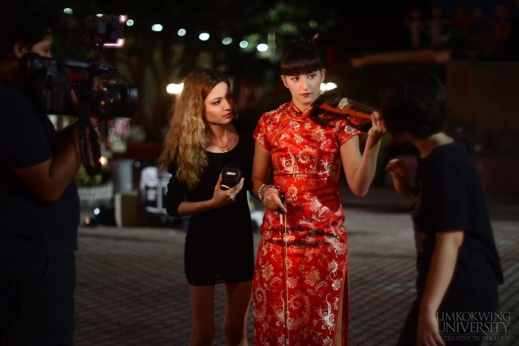 Her music has helped her transcend borders and cultures (pictured wearing a Chinese cheongsam dress)