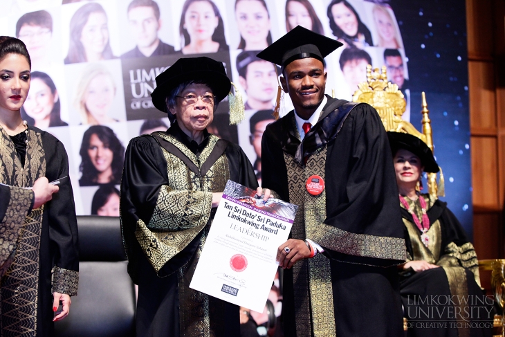 One of the award winning students receiving his certificate