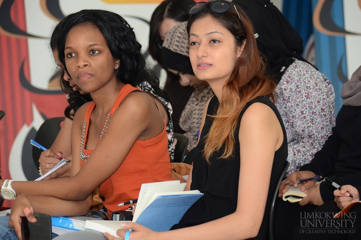 The students listening attentively to the talk