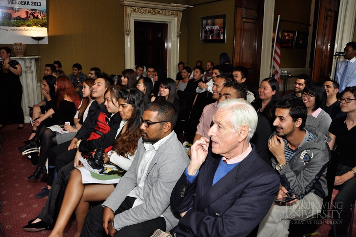 The crowd listening attentively to the presentation