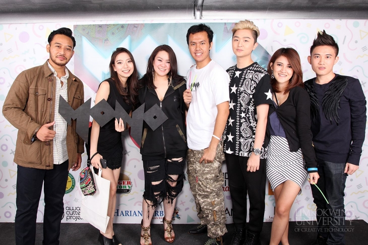 Limkokwing Vice President Dato' Tiffanee Lim (3rd from left) joining in the fun at the photo booth