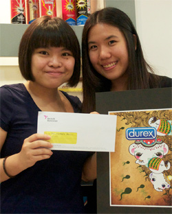 Tan Pei Xia (right), from Malaysia is still overjoyed, and she shows off her exceptional design