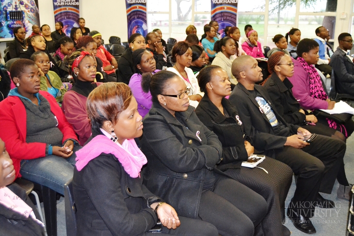 Staff and students listening attentively to the talk