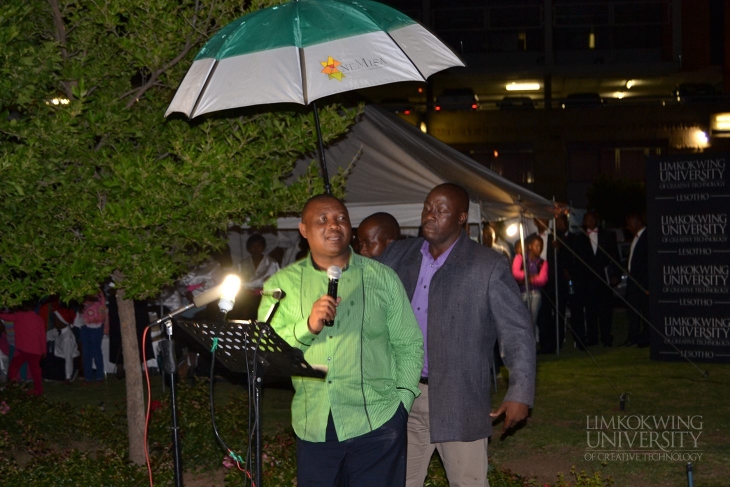 Hon. DPM, Hon. Mothejoa Metsing, giving a speech despite the rain