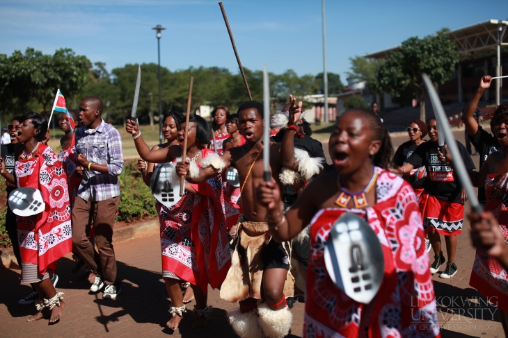 The students entertained the guests with music and dance